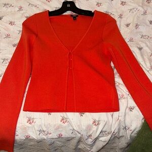 Express, size medium, coral color, 3 buttons, open from the bottom